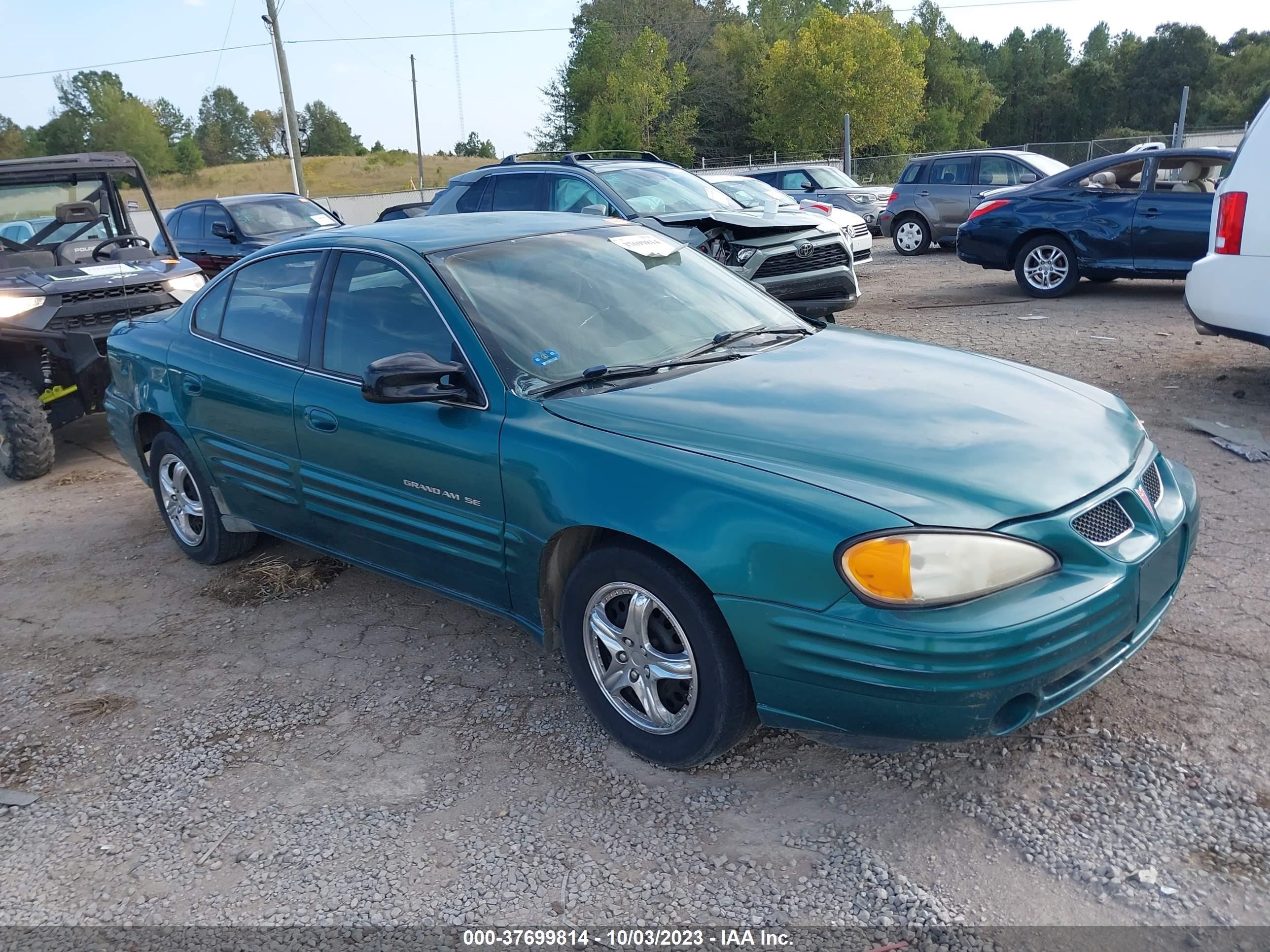 pontiac grand am 1999 1g2ne52t3xm899925