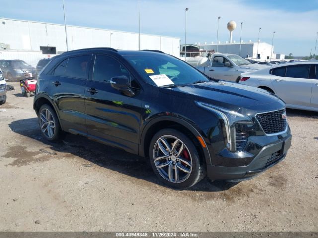 cadillac xt4 2021 1gyfzer40mf039140