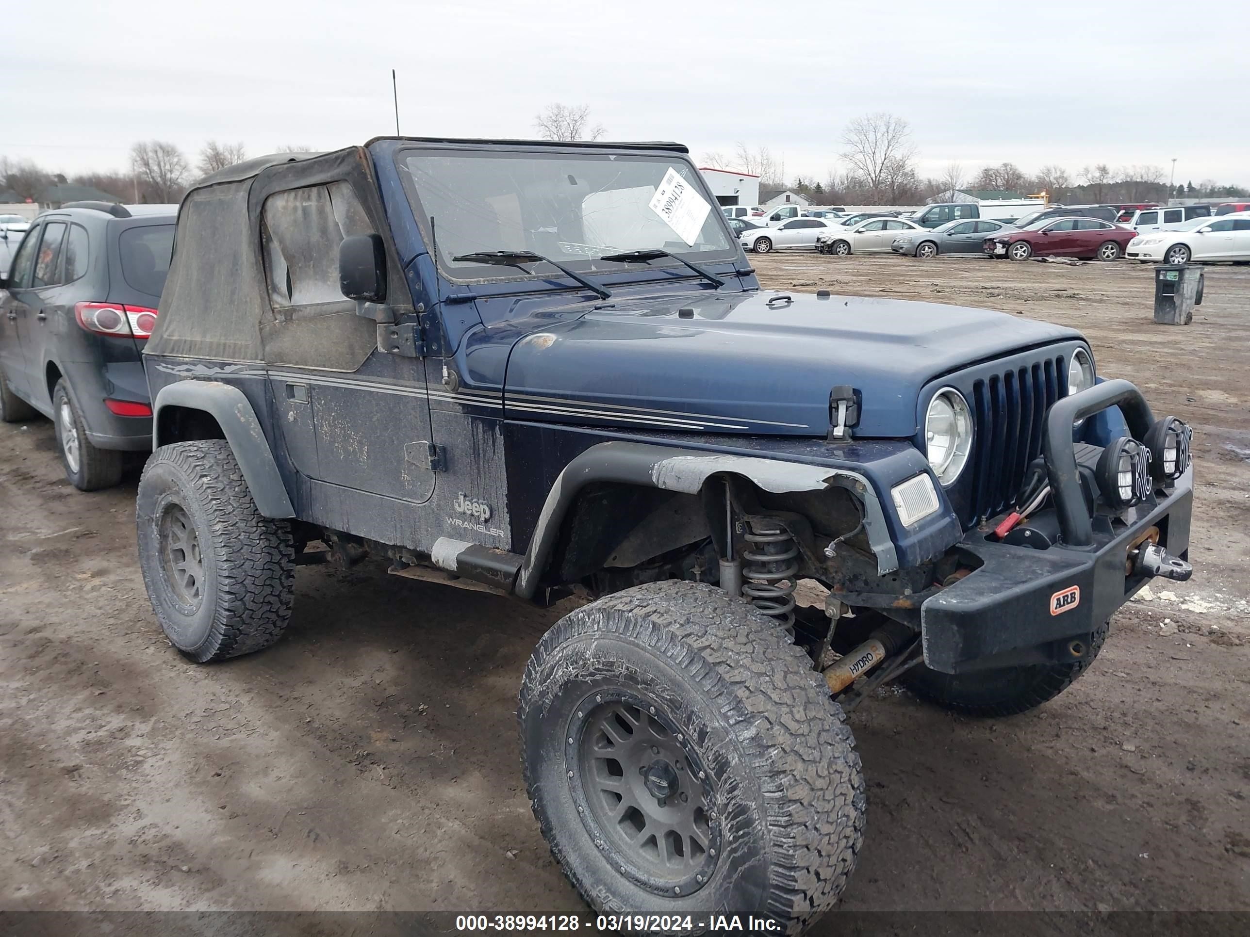 jeep wrangler 2004 1j4fa29184p717459