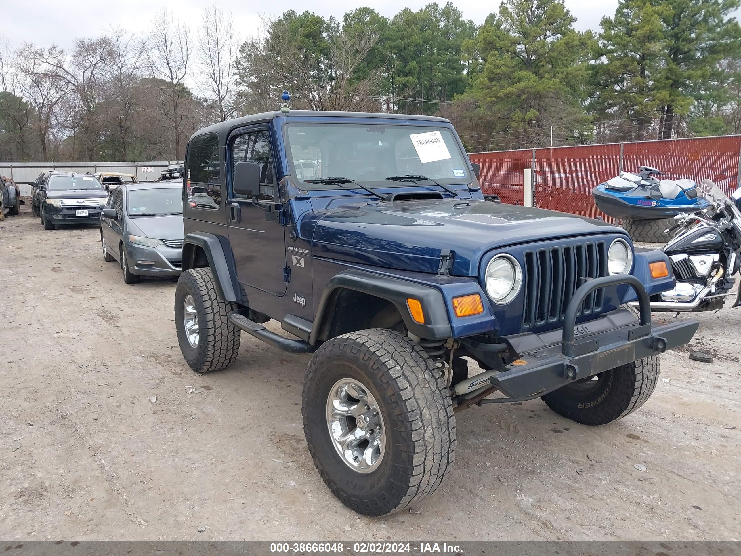 jeep wrangler 2002 1j4fa39s42p775466