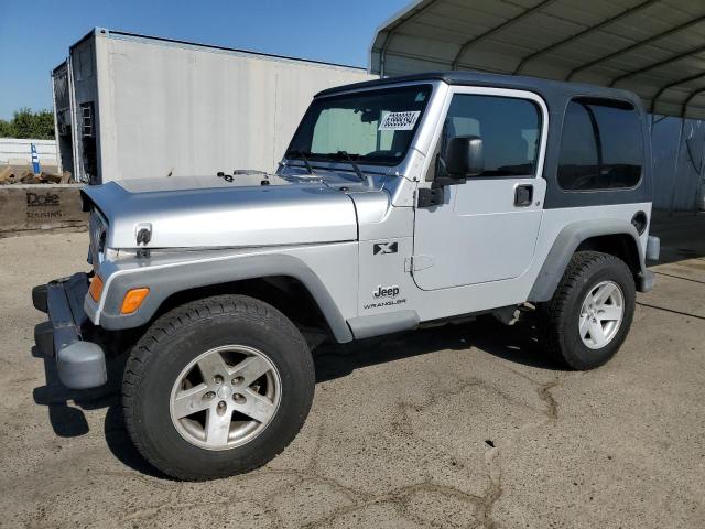 jeep wrangler 2004 1j4fa39s64p717619