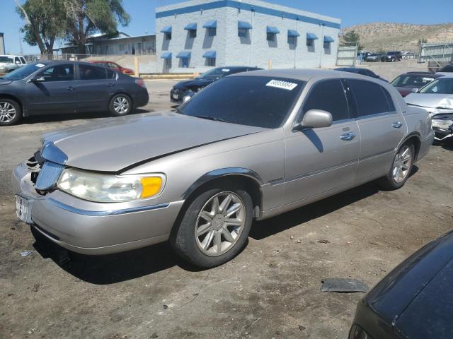 lincoln town car e 1999 1lnhm81w0xy677145