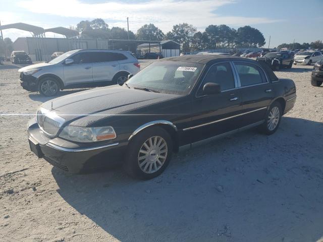 lincoln town car e 2004 1lnhm81w64y688534