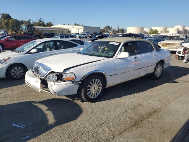 lincoln town car e 2004 1lnhm81w74y669443