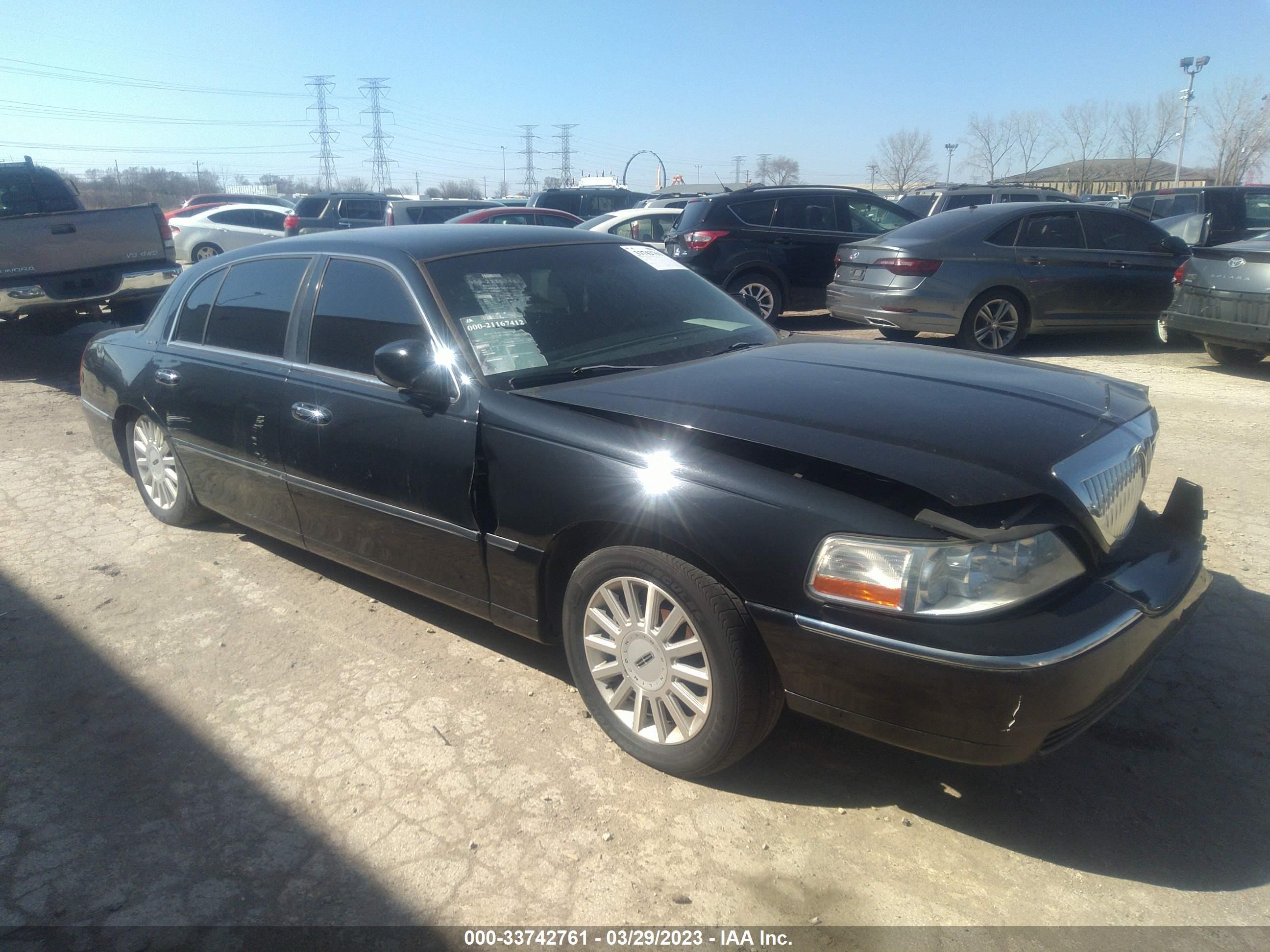 lincoln town car 2005 1lnhm85w75y657272