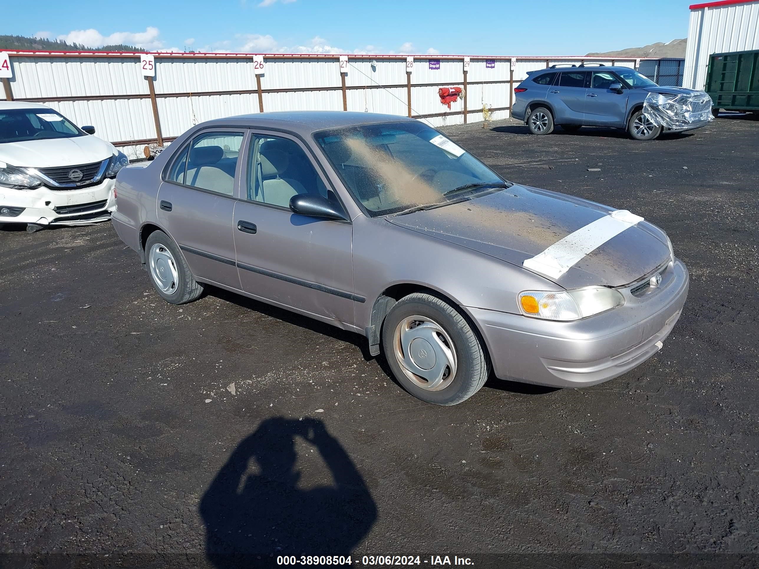 toyota corolla 1999 1nxbr12e0xz175117