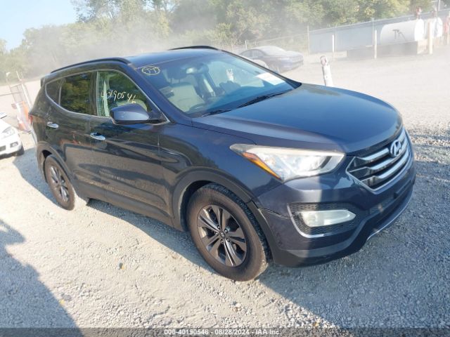 hyundai santa fe 2015 5xyzu3lb2fg265337