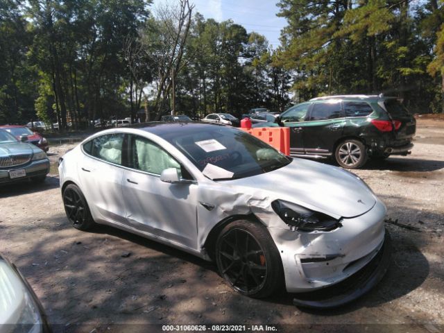 tesla model 3 2018 5yj3e1ea7jf057594