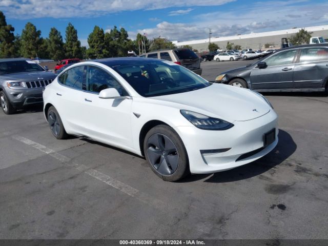 tesla model 3 2018 5yj3e1eaxjf009233