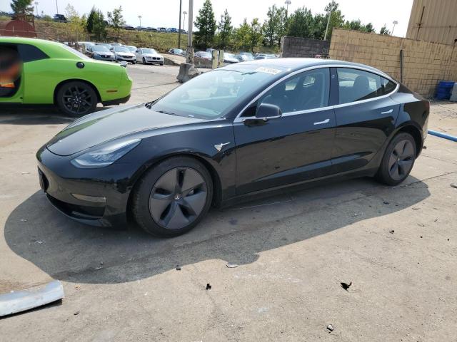 tesla model 3 2018 5yj3e1eaxjf031409