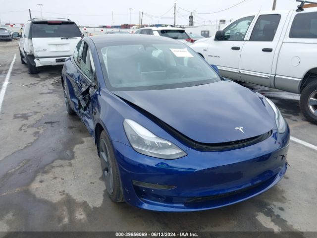 tesla model 3 2023 5yj3e1eaxpf710329