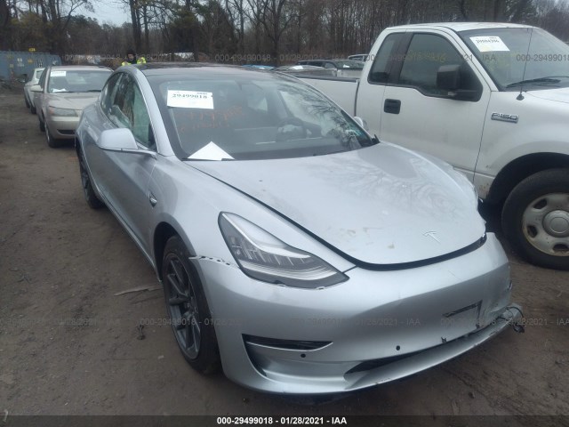 tesla  2018 5yj3e1eb4jf065063