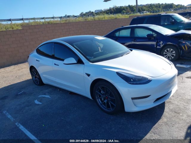 tesla model 3 2022 5yj3e1eb5nf357312