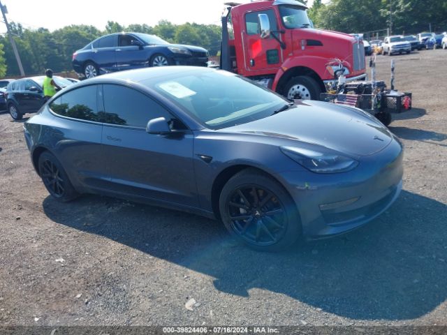 tesla model 3 2023 5yj3e1ebxpf592131