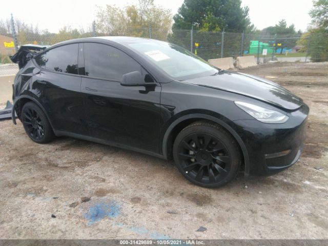 tesla model y 2021 5yjygdeexmf091229