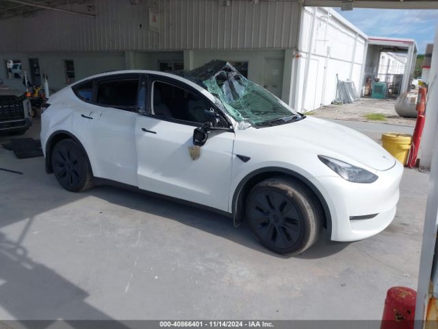 tesla model y 2024 7saygaee0rf100657