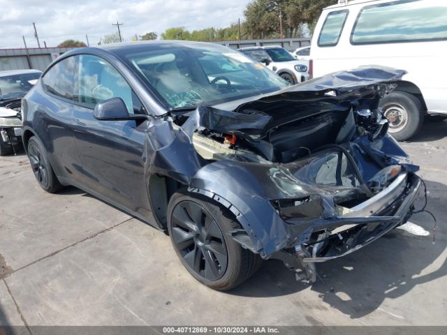 tesla model y 2024 7saygaee0rf104028