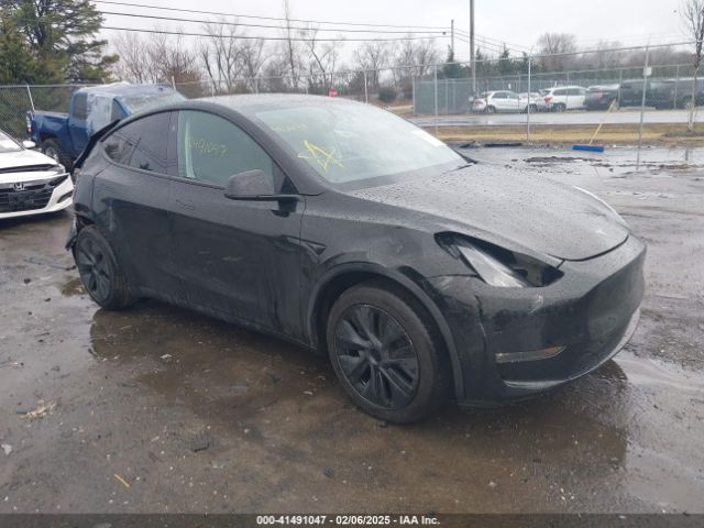 tesla model y 2024 7saygaee2rf182116