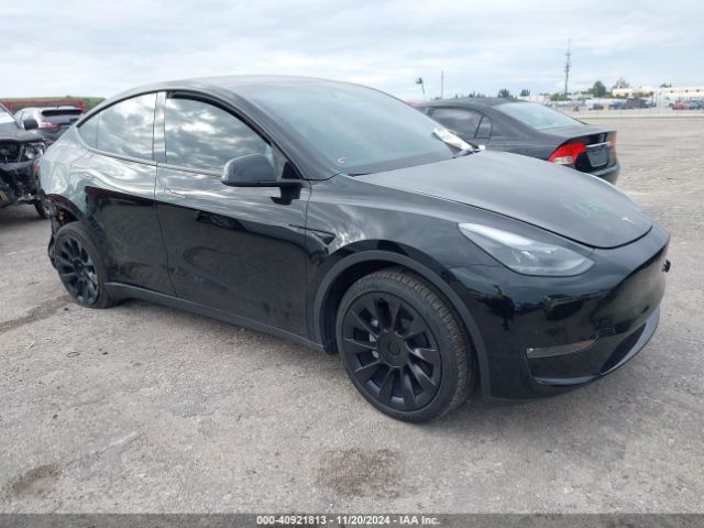 tesla model y 2023 7saygaee5pf900075