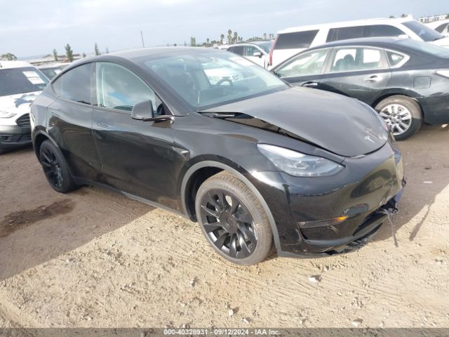 tesla model y 2024 7saygaee6rf150348