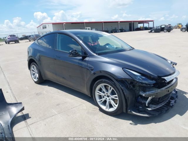 tesla model y 2024 7saygded1rf052031