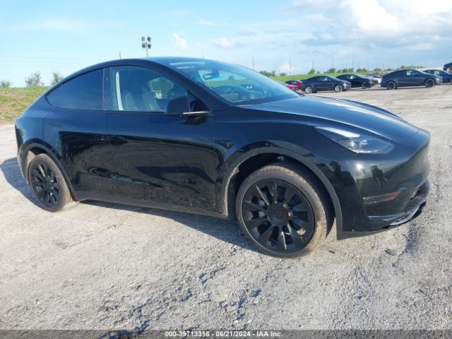 tesla model y 2024 7saygded1rf095087