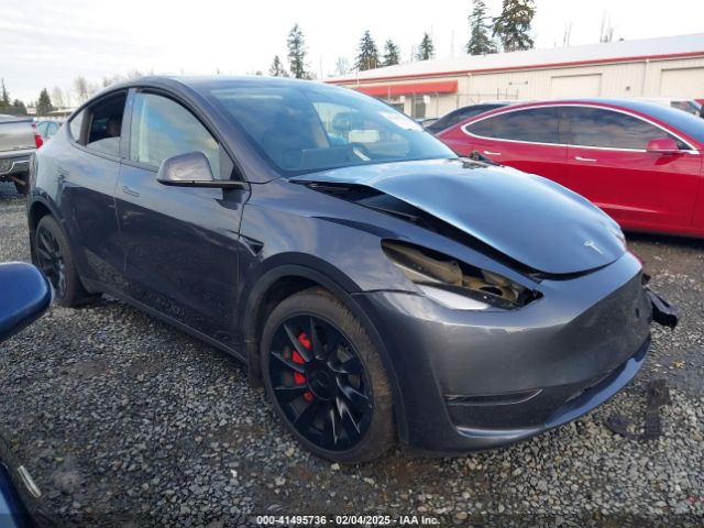 tesla model y 2023 7saygdee1pf630098