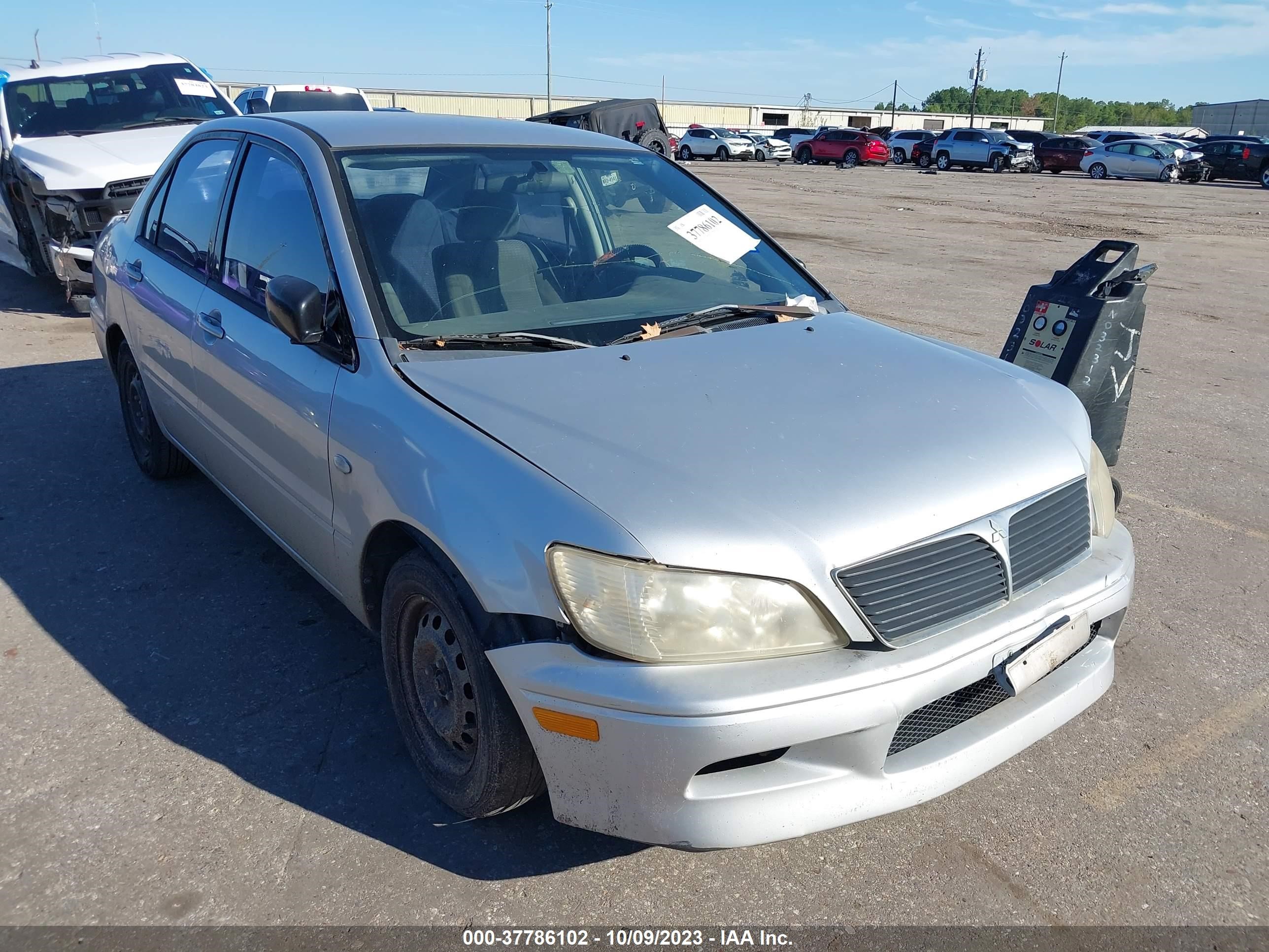 mitsubishi lancer 2002 ja3aj26ex2u040371