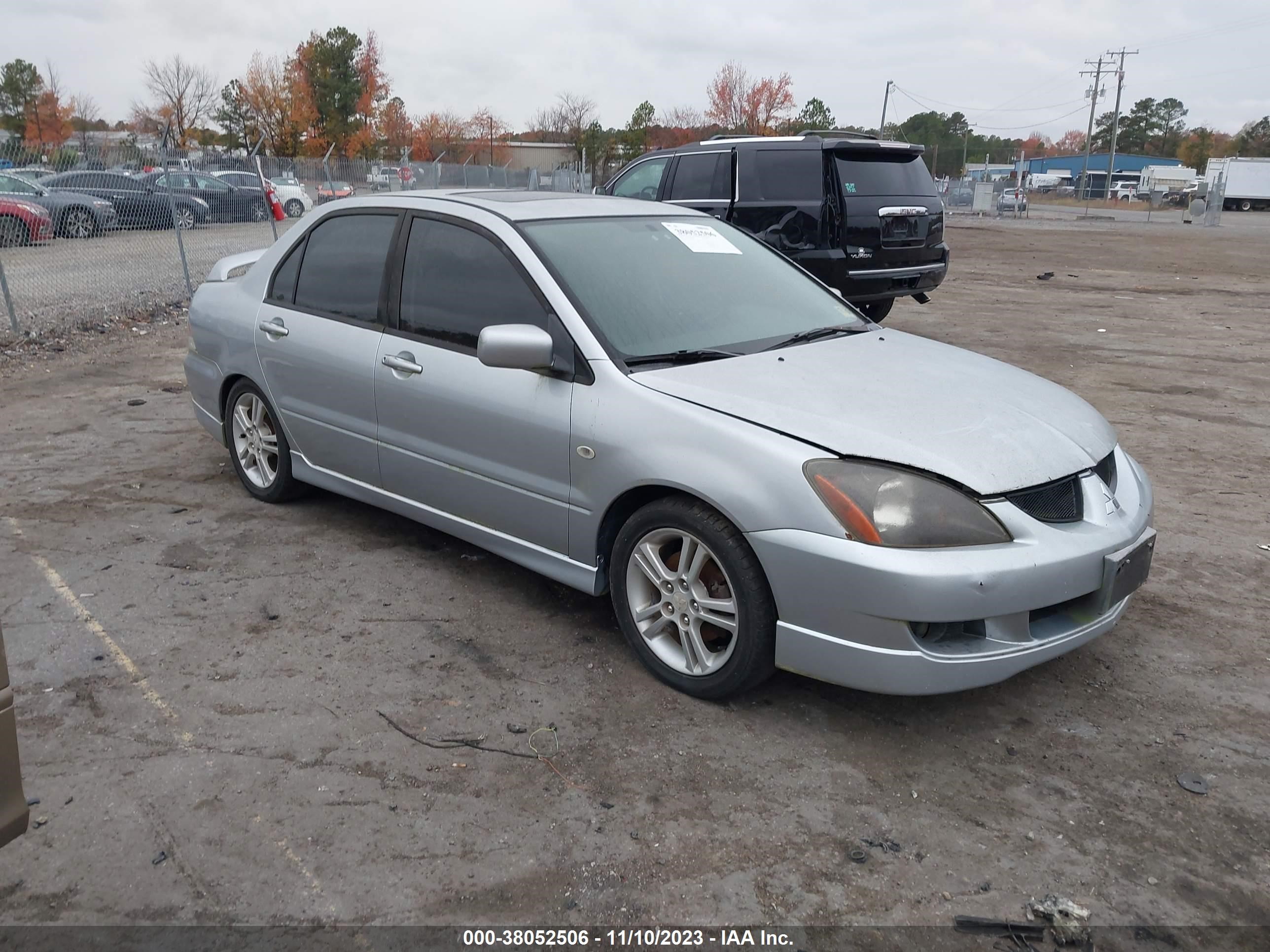 mitsubishi lancer 2004 ja3aj66f24u026659