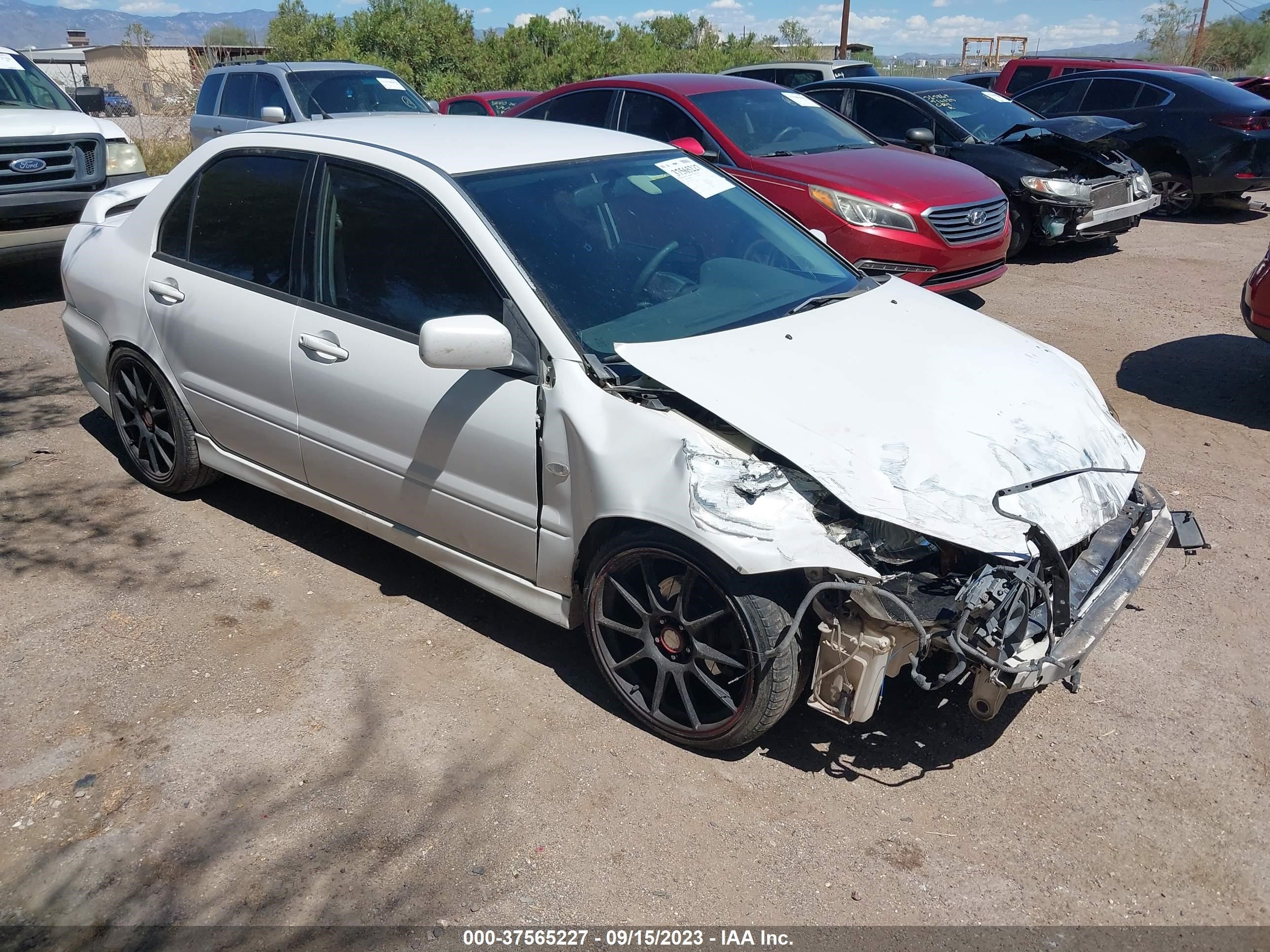 mitsubishi lancer 2004 ja3aj66f54u044735