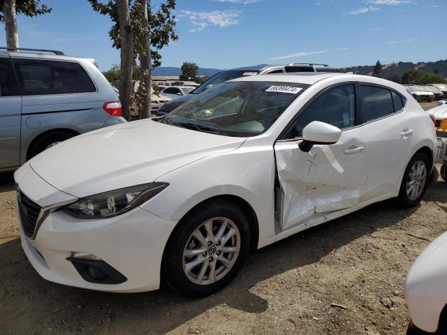 mazda 3 grand to 2016 jm1bm1n75g1292371