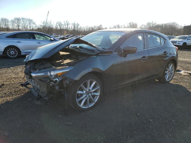 mazda 3 grand to 2017 jm1bn1m35h1140751