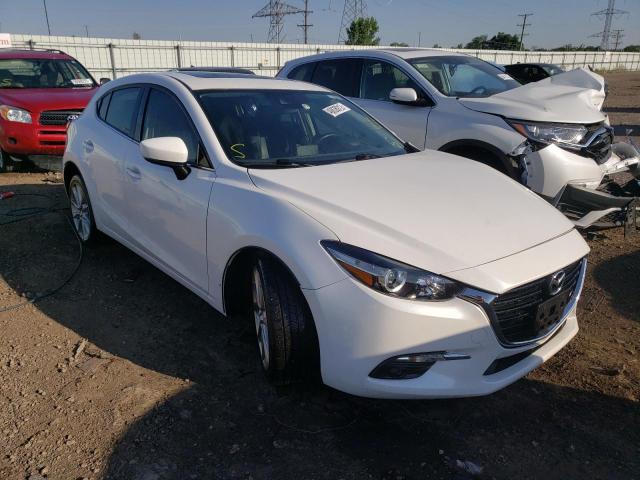 mazda 3 grand to 2017 jm1bn1m36h1119570