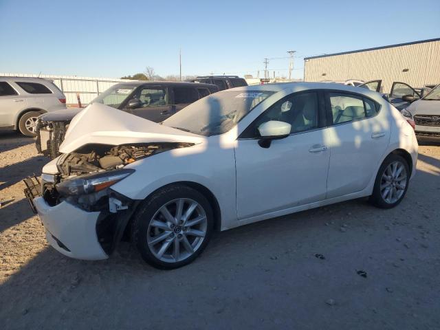 mazda 3 grand to 2017 jm1bn1m36h1125532