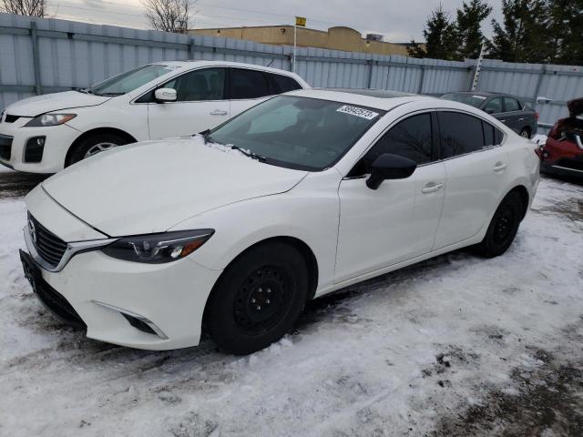 mazda 6 grand to 2016 jm1gj1w53g1477045