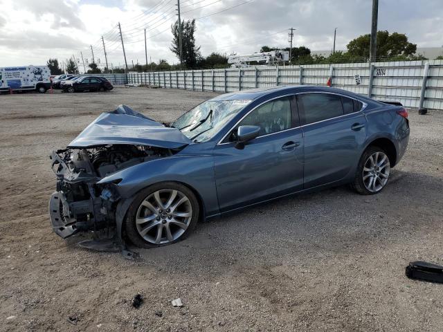 mazda 6 grand to 2014 jm1gj1w59e1108042