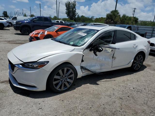 mazda 6 grand to 2018 jm1gl1ty0j1314482