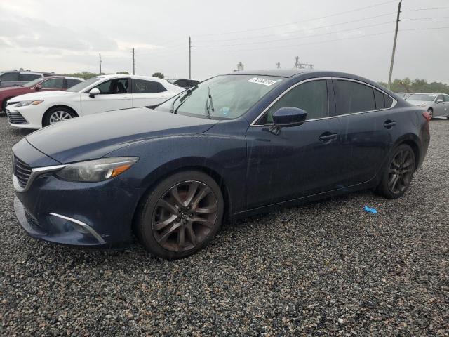 mazda 6 grand to 2017 jm1gl1w54h1103054