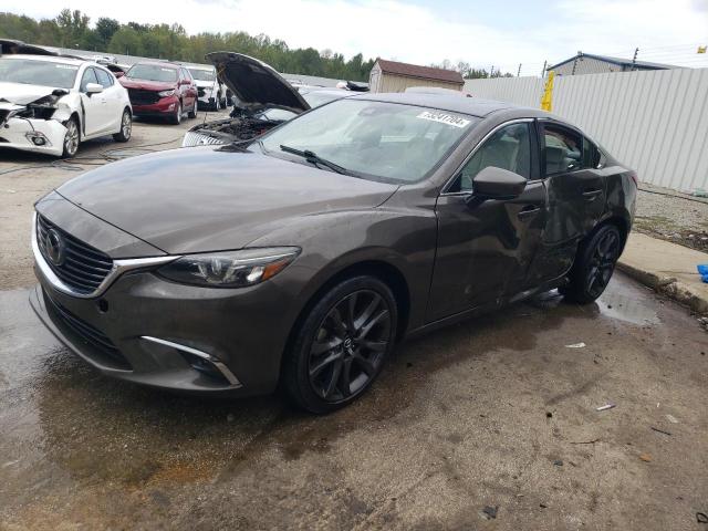 mazda 6 grand to 2017 jm1gl1x52h1100460