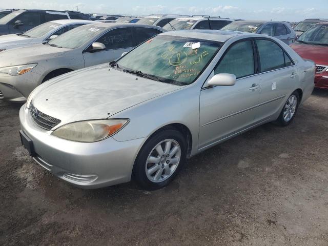 toyota camry le 2002 jtdbe30k320113697