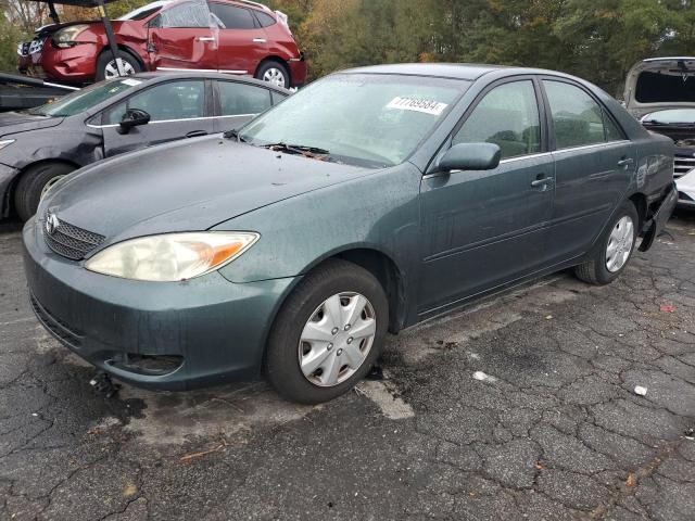 toyota camry le 2002 jtdbe32k120013983