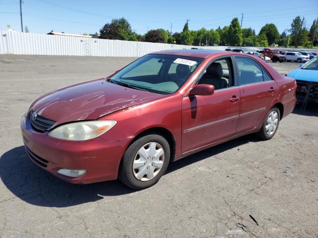 toyota camry le 2002 jtdbe32k120129863