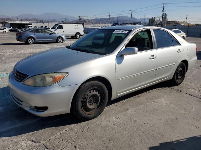 toyota camry le 2003 jtdbe32k930165897