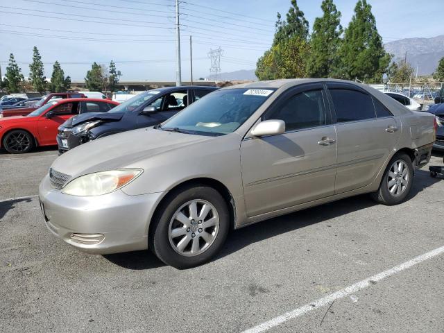 toyota camry le 2002 jtdbf30k220065381