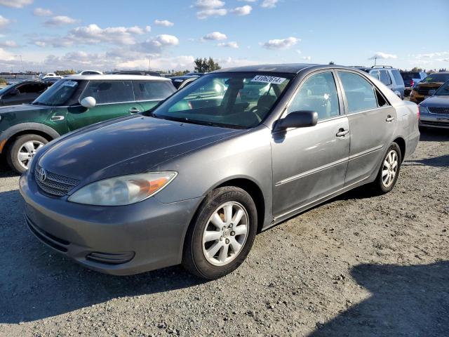 toyota camry le 2002 jtdbf30k520003957