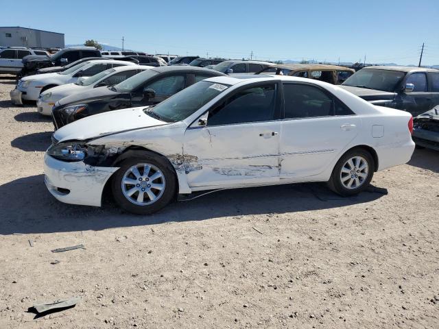 toyota camry le 2002 jtdbf30k720038628