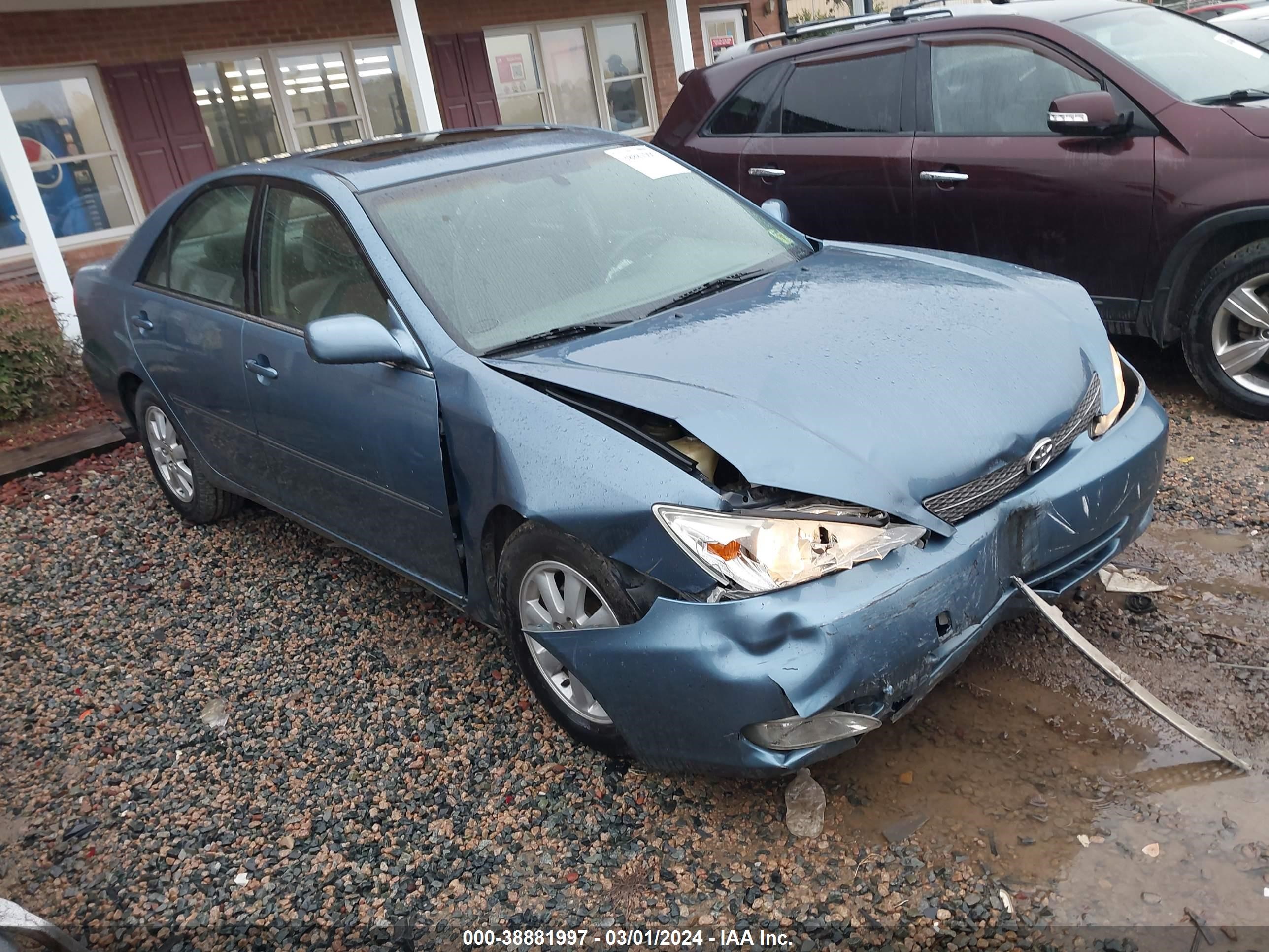 toyota camry 2004 jtdbf32k740154461