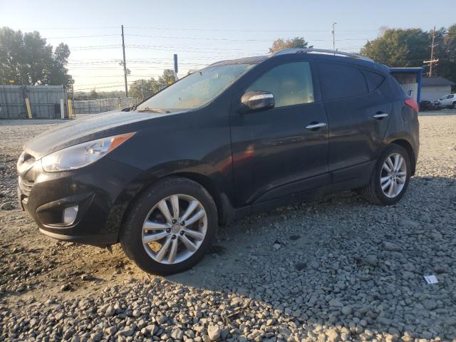 hyundai tuscon 2011 km8ju3ac9bu297523