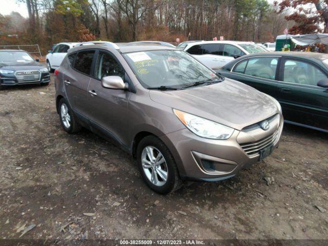 hyundai tucson 2011 km8jucac7bu274127