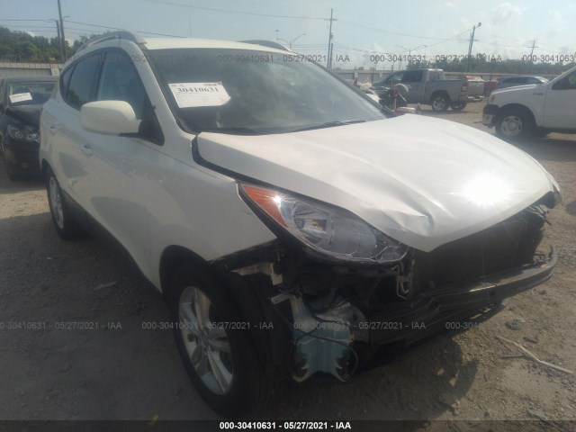 hyundai tucson 2011 km8jucac7bu309054